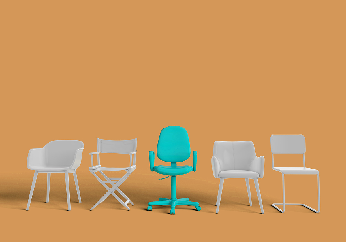 row of chairs all white except one green one