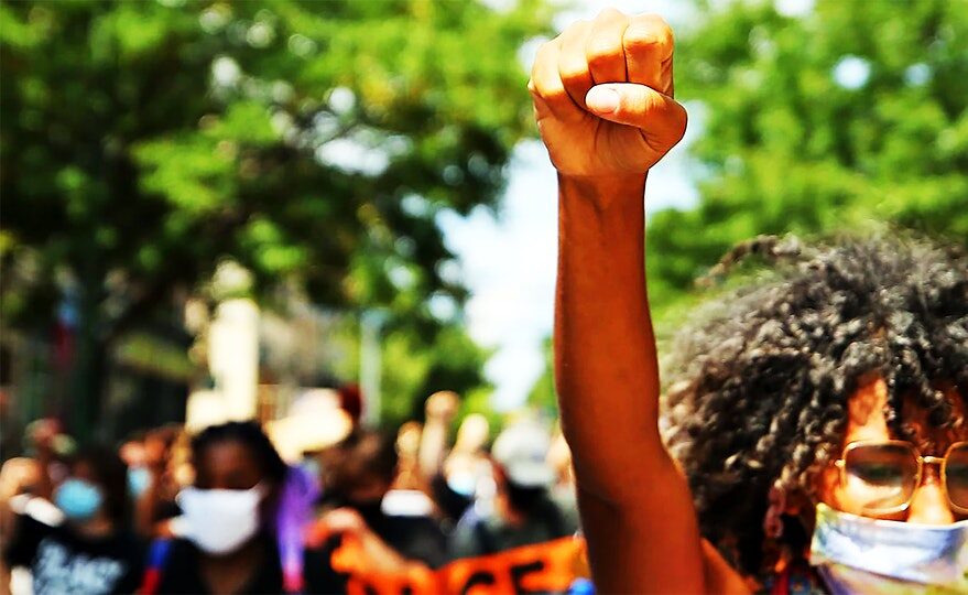 woman with her fist in the air