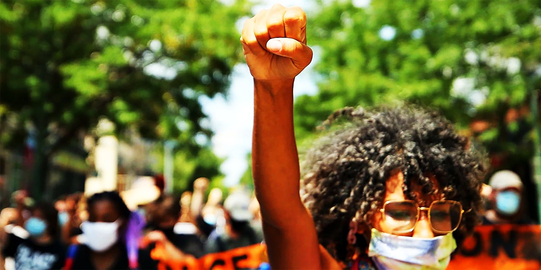 woman with her fist in the air