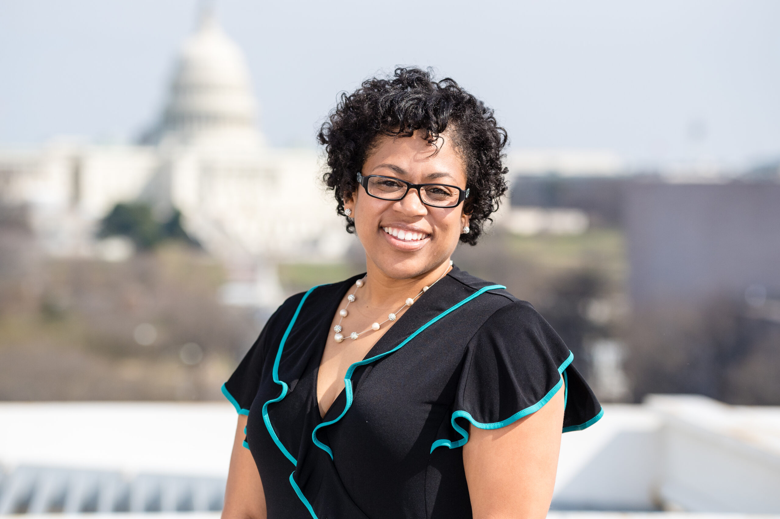 photo of Sabrina Dent with capital in the background