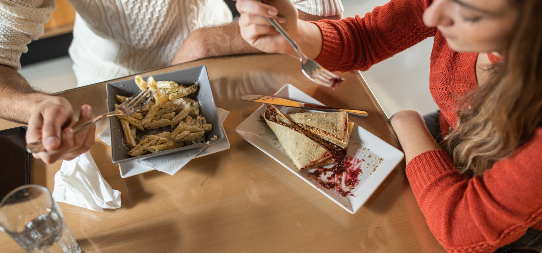 two people eating together