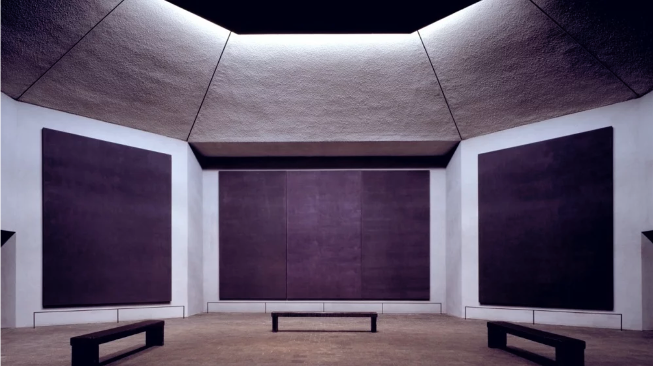 image depicting empty gallery space with three large black purply monochrome painted canvases and three black benches in front of each