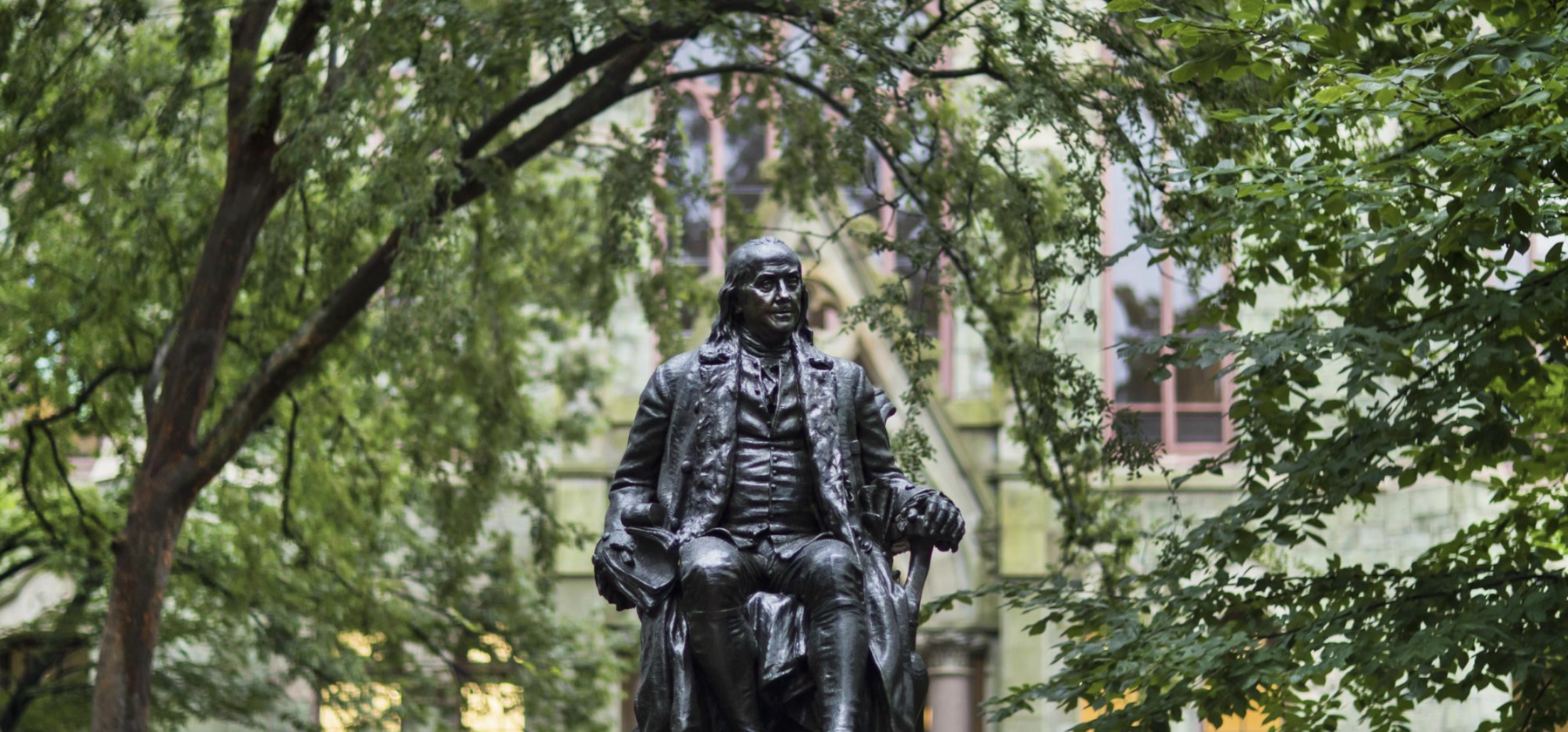 image of seated Benjamin Franklin statue on Penn's campus